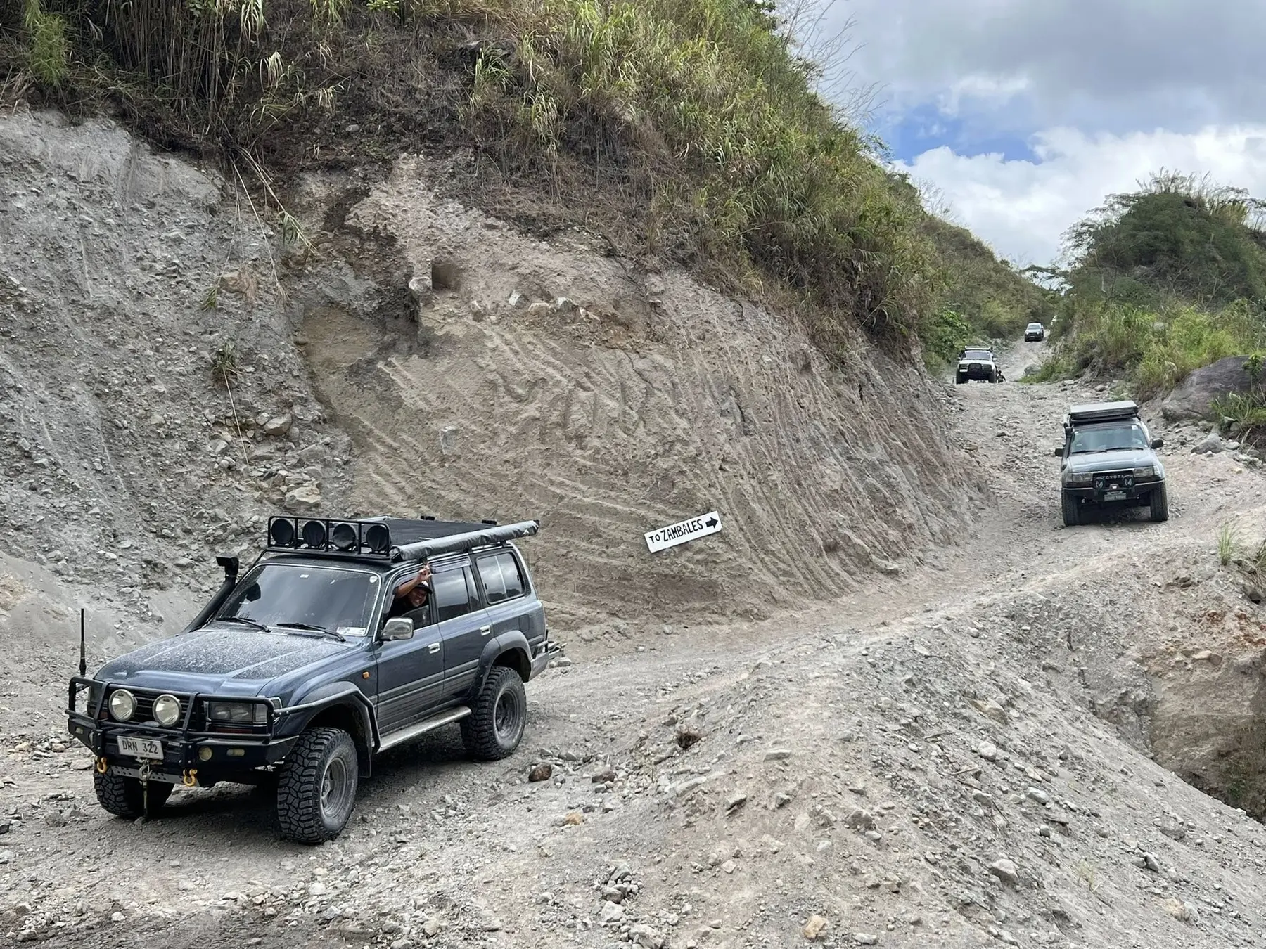 A 4x4 vehicle navigating an off-road trail